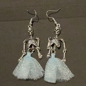 Skeleton earrings .